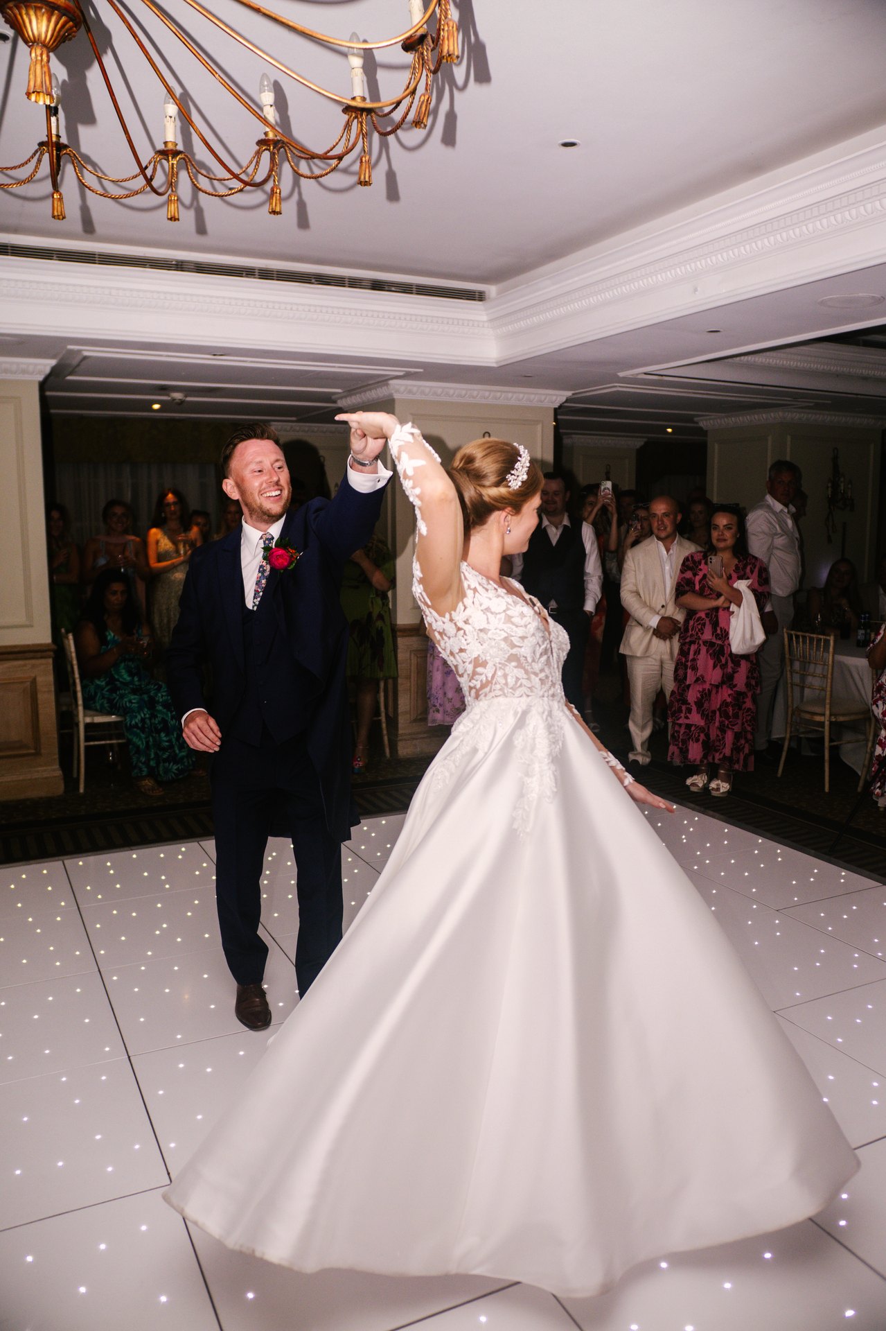 Lily and Piers dancing together at their reception